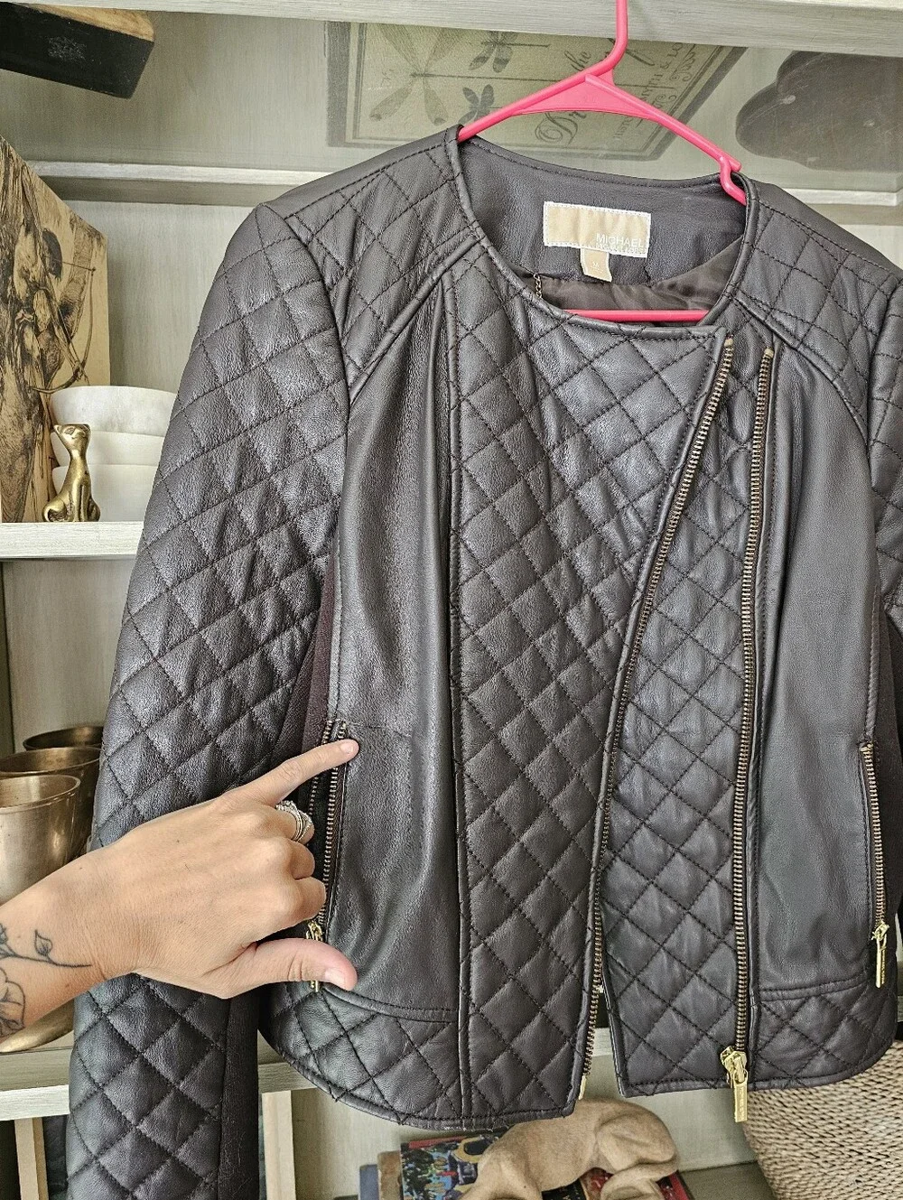 Michael Kors better pictured hardware